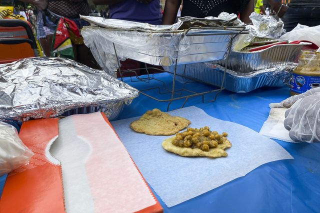 Doubles -- a Trinidadian snack -- being served at Brooklyn J'Ouvert on Monday.